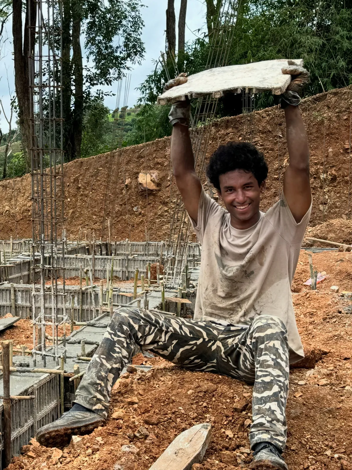 Sai lifting a plank overhead