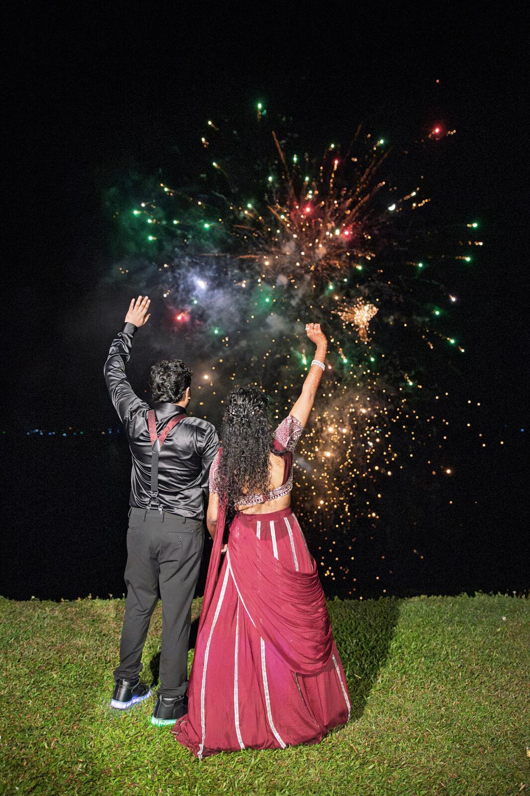 Sakthi and Manju under fireworks